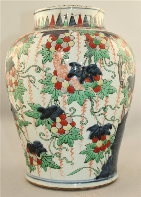A Chinese wucai baluster jar, 17th century, 32cm., broken and restored